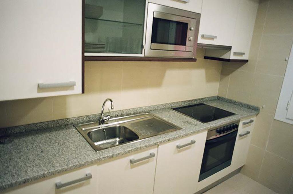 Apartamentos Auhabitat Zaragoza, edificio de apartamentos turísticos con facilidad de parking Saragoça Quarto foto
